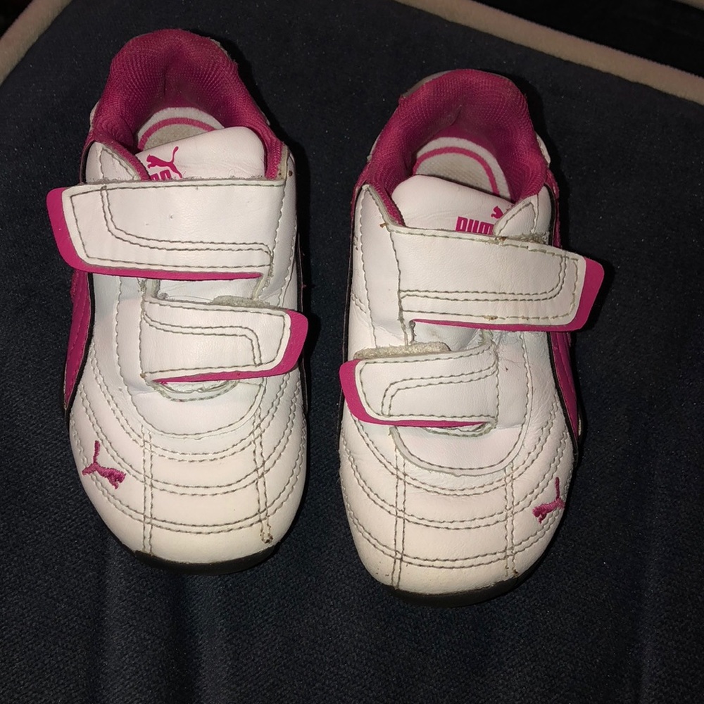 White with pink striped Pumas